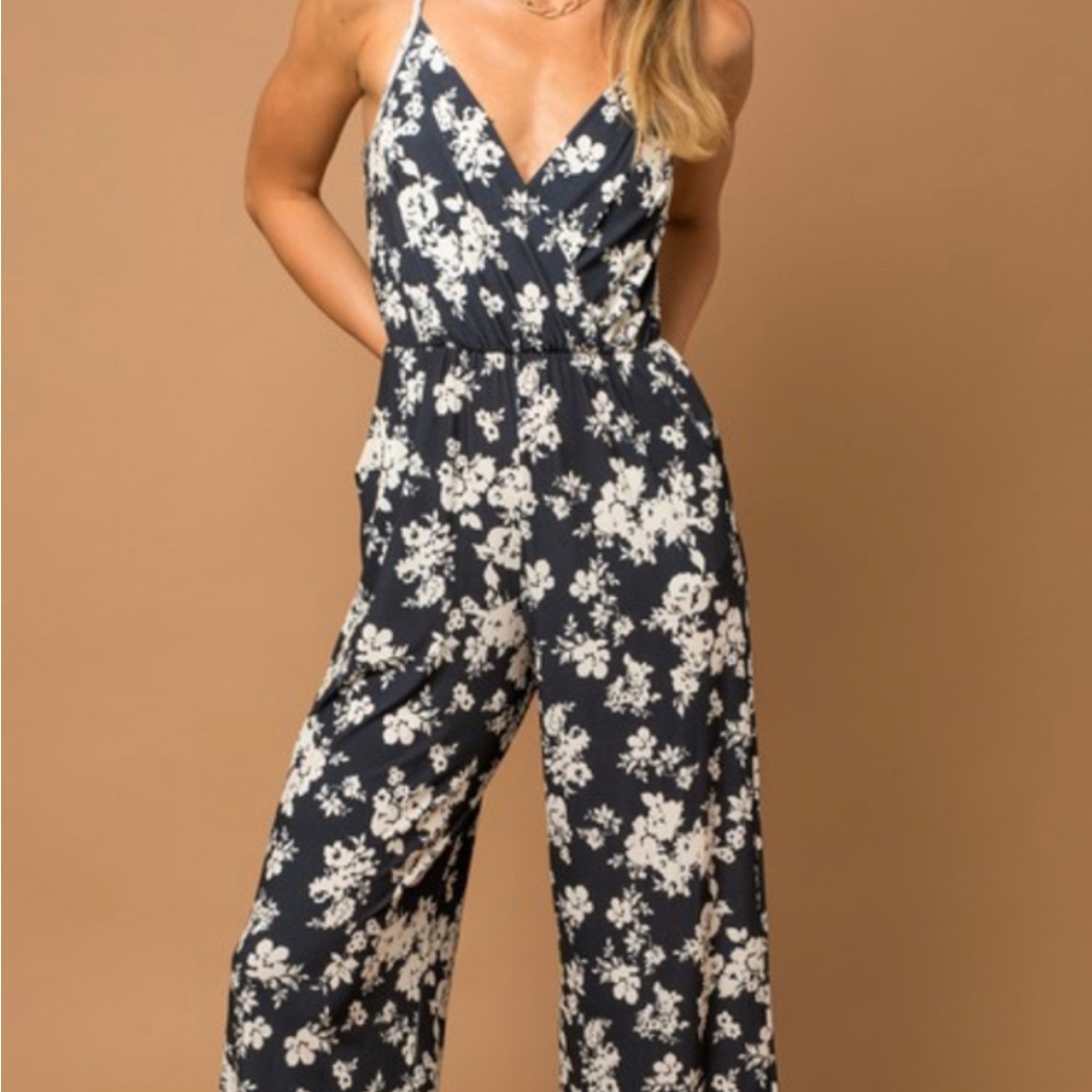 Gilli Surplice Jumpsuit size medium. Brand new with tags. Navy.